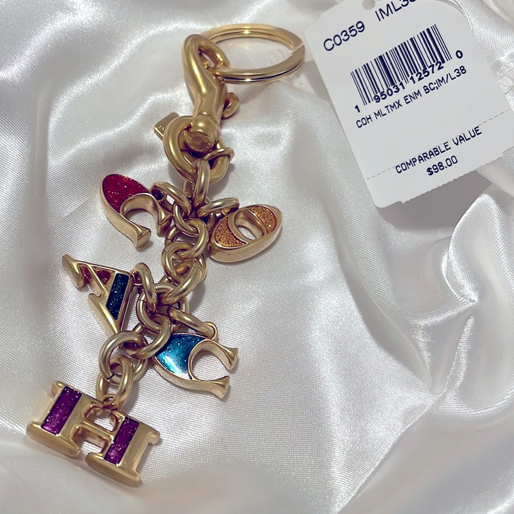 Coach multi colored purse charm